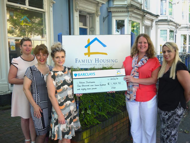FHA Wales staff present Three Peaks cheque to Action Duchenne